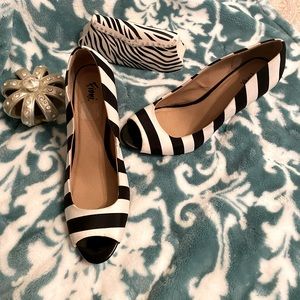 Black and white striped heeled shoes